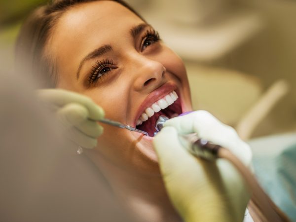 Fluoride Treatment Houston | Professional Fluoride Solution for Adult Teeth  - Edge Dental