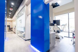 Dental office hallway and treatment area at Edge Dental Houston